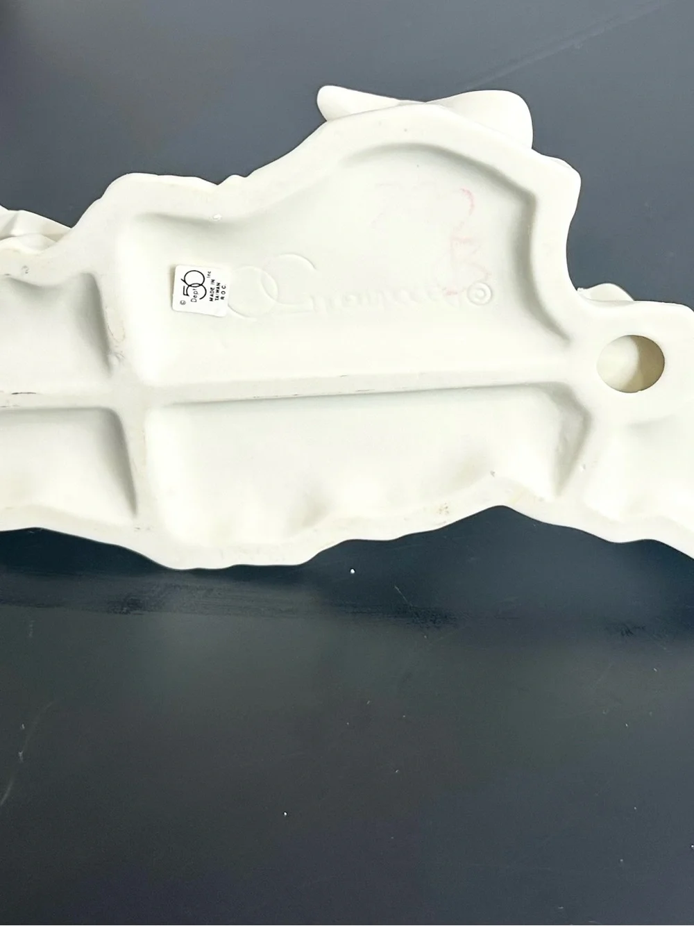 Department 56 Cream Ceramic Angel child on Sled Figurine